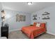Comfortable bedroom with natural light, modern decor, and plush carpeting for a relaxing ambiance at 130 Willow Bend Dr, Youngsville, NC 27596