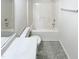 Bathroom featuring a combined shower and tub, toilet, vanity, and modern fixtures at 1628 Beacon Village Dr, Raleigh, NC 27604