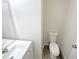 Bathroom showcasing a sink, vanity, a mirror, toilet, and modern hardware at 1628 Beacon Village Dr, Raleigh, NC 27604