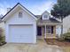 Charming single-Gathering home with a one-car garage and inviting curb appeal at 1628 Beacon Village Dr, Raleigh, NC 27604