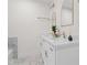 Bathroom featuring double sinks, and white marbled floor at 1915 Lambert Rd, Graham, NC 27253