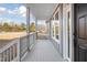 Charming front porch with painted wood floors and railings at 1915 Lambert Rd, Graham, NC 27253