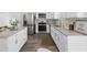 Modern kitchen with stainless steel appliances, tile backsplash, granite countertops, and shaker style cabinets at 1915 Lambert Rd, Graham, NC 27253