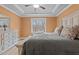 Bedroom with a large window and matching furniture at 2482 Golden Forest Dr, Franklinton, NC 27525