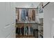 Walk-in closet with built-in shelving at 2482 Golden Forest Dr, Franklinton, NC 27525