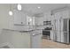 Kitchen featuring white cabinets, stainless steel appliances, and granite countertops at 2482 Golden Forest Dr, Franklinton, NC 27525