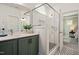 Updated bathroom features a glass enclosed shower and modern fixtures at 249 Beacon Dr, Pittsboro, NC 27312