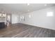 Bright living room featuring hardwood floors, recessed lighting and multiple windows at 257 Beacon Dr, Pittsboro, NC 27312