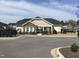 Community center boasts well-maintained landscaping and accessible parking at 306 Brier Summit Pl, Durham, NC 27703