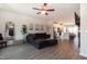 Bright living room boasts an open concept, modern floors, and views into the kitchen at 306 Brier Summit Pl, Durham, NC 27703