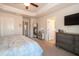 Relaxing main bedroom with ensuite bath, plush carpet, and lots of storage space at 306 Brier Summit Pl, Durham, NC 27703