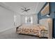 Main bedroom with trey ceilings, carpeted floors, and a statement wall at 313 Jorpaul Dr, Wake Forest, NC 27587