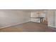 Spacious carpeted hallway on the upper floor with white banister at 326 Umstead St, Sanford, NC 27330
