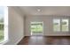 The living room is bright with a large sliding glass door that opens onto a backyard with great views at 326 Umstead St, Sanford, NC 27330