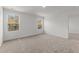Bedroom featuring carpeted floors, white walls, and natural light at 40 Rolling Banks Dr, Louisburg, NC 27549