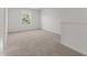 Upstairs bedroom with carpet and white walls at 40 Rolling Banks Dr, Louisburg, NC 27549