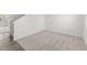 Neutral bedroom featuring a large window, carpet floors, and white walls at 40 Rolling Banks Dr, Louisburg, NC 27549