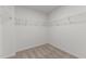 Walk-in closet featuring carpet flooring and wire shelving at 40 Rolling Banks Dr, Louisburg, NC 27549