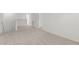 Upstairs hallway with carpet and white walls at 40 Rolling Banks Dr, Louisburg, NC 27549