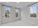 Bright bedroom with three large windows offering a pleasant outdoor view at 418 1/2 St Marys St, Raleigh, NC 27605