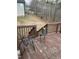 Wooden deck overlooking a serene backyard, perfect for outdoor relaxation and entertaining at 421 Angus Pl, Stem, NC 27581