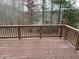 Wood deck featuring railings with a backyard view at 421 Angus Pl, Stem, NC 27581