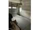 Spacious garage featuring an automatic door opener and convenient access door to the home's interior at 421 Angus Pl, Stem, NC 27581