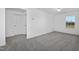 Neutral carpeted bedroom with a window for natural light at 43 Mable Court # 4, Lillington, NC 27546