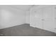 Carpeted bedroom with natural light and a large closet for storage at 43 Mable Court # 4, Lillington, NC 27546