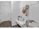 Cozy entryway with built-in bench, stylish pillows, and convenient storage hooks at 43 Mable Court # 4, Lillington, NC 27546
