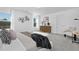 Airy main bedroom features a large window, modern decor, and comfortable seating at 43 Mable Court # 4, Lillington, NC 27546