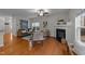 Comfortable living room with hardwood floors, fireplace, and stylish furnishings at 532 Smithridge Way, Fuquay Varina, NC 27526