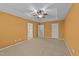 Spacious main bedroom with ceiling fan, neutral carpet, and ample natural light at 532 Smithridge Way, Fuquay Varina, NC 27526