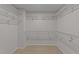 Large walk-in closet with ample shelving and storage for an organized wardrobe at 532 Smithridge Way, Fuquay Varina, NC 27526
