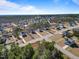 An aerial view of the neighborhood shows the many homes in a well-planned community at 594 Executive Dr, Lillington, NC 27546