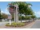 Welcoming Oakmont community entrance with well-maintained landscaping and signage at 594 Executive Dr, Lillington, NC 27546
