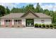 Community pool behind the clubhouse at 594 Executive Dr, Lillington, NC 27546