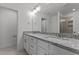 Bathroom featuring granite counters, double sinks, and a large mirror at 945 Alma Railway Dr # 559, Wake Forest, NC 27587