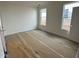 Bright bedroom with two windows, offering ample natural light and a view at 945 Alma Railway Dr # 559, Wake Forest, NC 27587