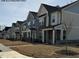 Charming two-story townhomes featuring varied color schemes, covered front porches and well manicured lawns in an attractive community at 945 Alma Railway Dr # 559, Wake Forest, NC 27587