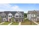 Inviting townhome exterior with covered porch and stylish architectural details at 945 Alma Railway Dr # 559, Wake Forest, NC 27587