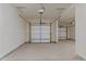 Spacious two car garage featuring two garage doors and ample room for vehicles and storage at 945 Alma Railway Dr # 559, Wake Forest, NC 27587