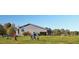Vast recreation field perfect for sports and activities with modern buildings as a backdrop at 945 Alma Railway Dr # 559, Wake Forest, NC 27587