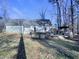 Expansive backyard featuring a patio and outdoor kitchen area, perfect for entertaining at 101 Madeline Ct, Youngsville, NC 27596