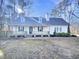 Charming single-story home featuring a covered front porch and traditional architectural details at 101 Madeline Ct, Youngsville, NC 27596