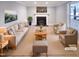 This virtually staged living room features a fireplace, neutral decor, and cozy seating arrangement at 101 Madeline Ct, Youngsville, NC 27596