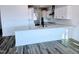 Spacious kitchen with a large island, stainless steel appliances, and white cabinets at 1021 Prominence Dr., Homesite 20, Durham, NC 27712