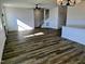 Bright and open living room with hardwood floors and lots of natural light at 1021 Prominence Dr., Homesite 20, Durham, NC 27712