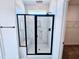 Modern shower with black hardware, marble surround, and built-in bench at 1021 Prominence Dr., Homesite 20, Durham, NC 27712