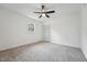 Bedroom featuring a ceiling fan, neutral carpeting, and closet space at 109 Chatterson Dr, Raleigh, NC 27615